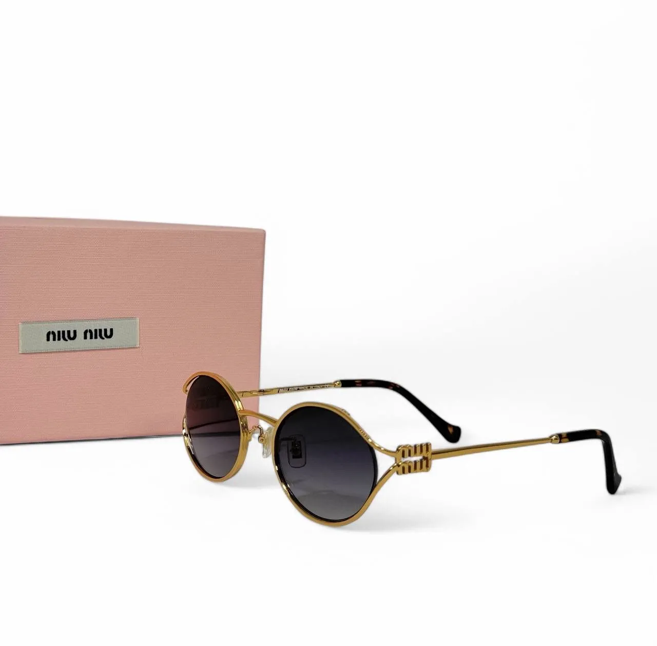 Очки солнцезащитные MIU MIU