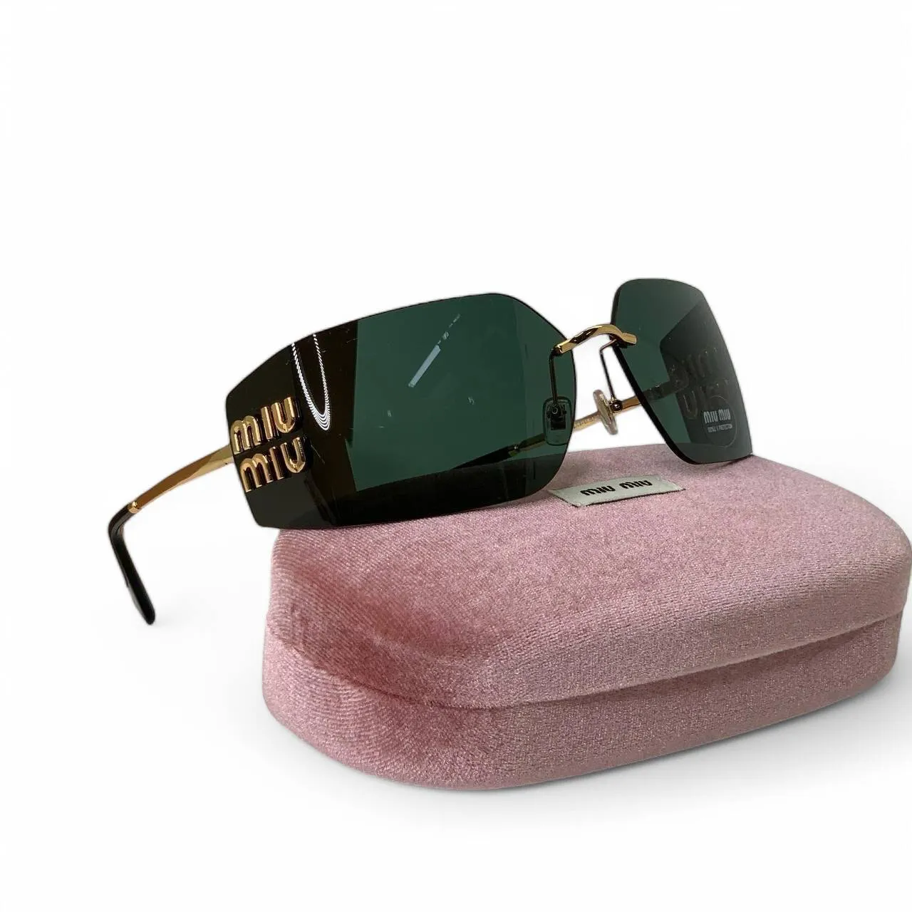 Солнцезащитные очки MIU MIU