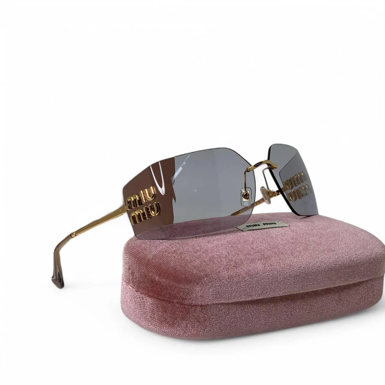 Солнцезащитные очки MIU MIU