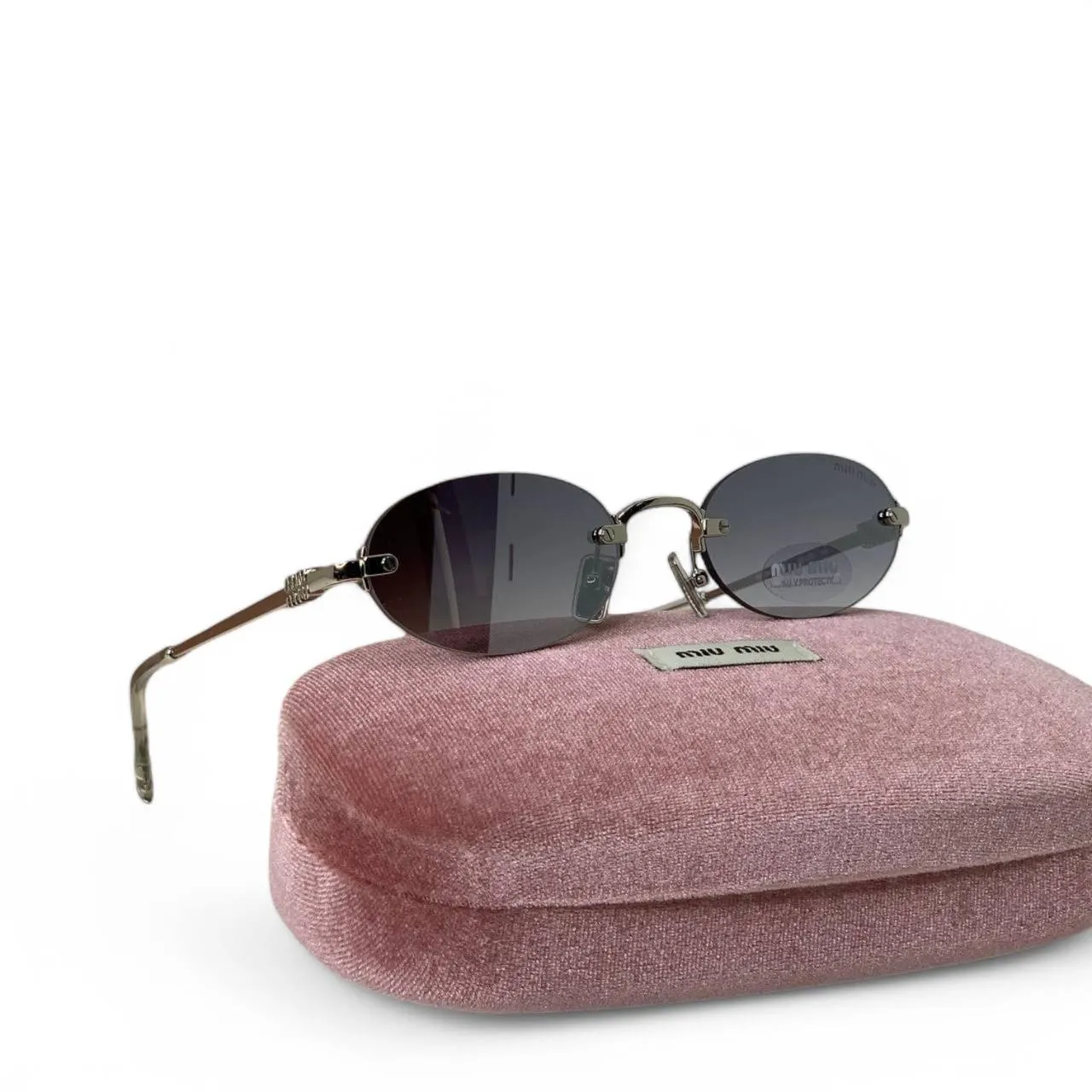 Солнцезащитные очки MIU MIU