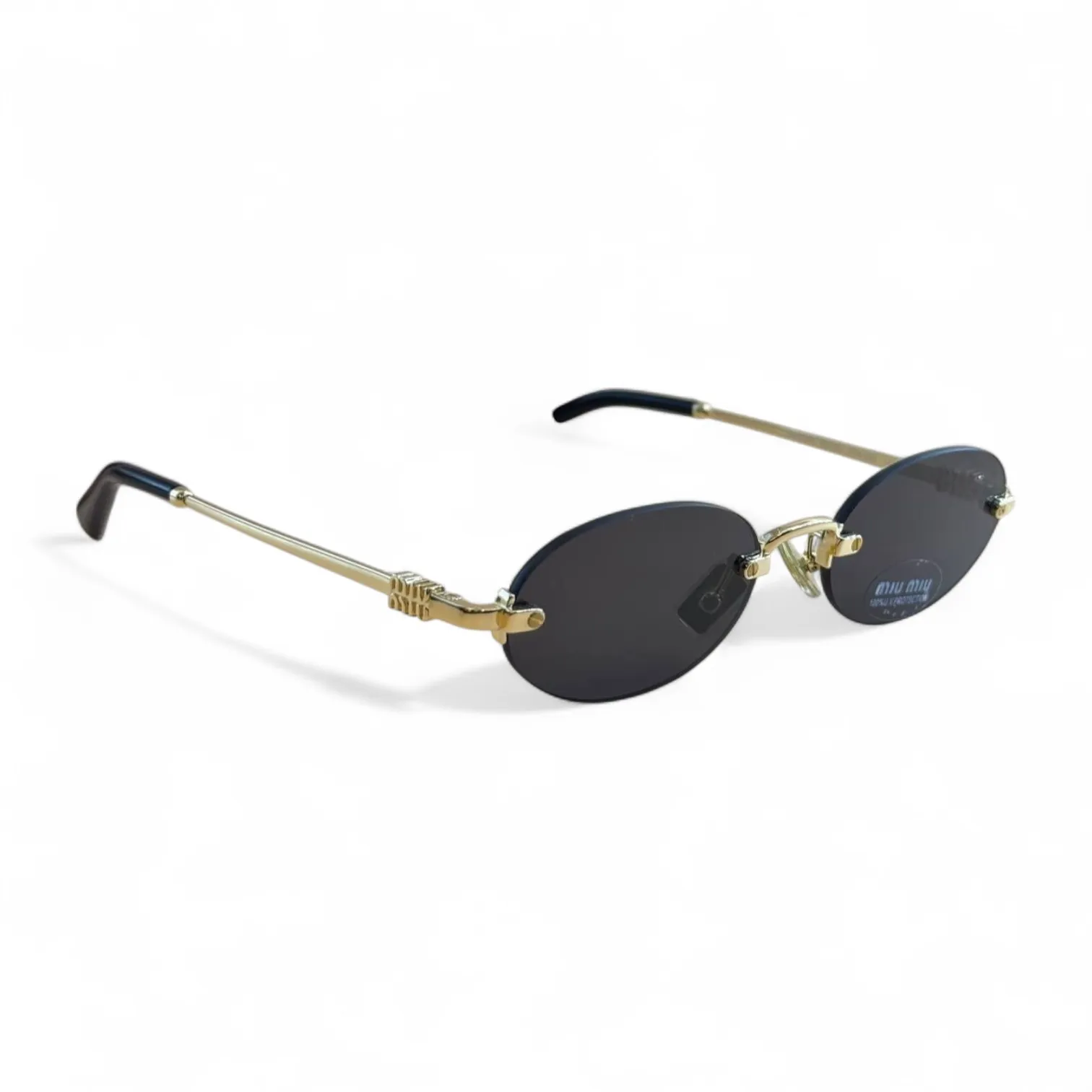 Солнцезащитные очки MIU MIU